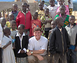 Dr. Bryan Thatcher with children in Kibeho